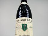 a bottle of wine that is sitting on a table
