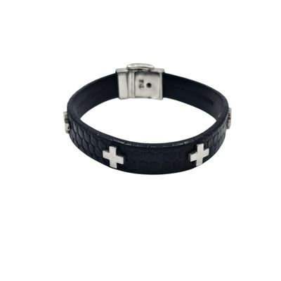 a black leather bracelet with a silver cross on it