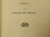 an old book that is open on a table