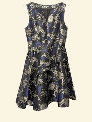 a black and blue dress with a floral pattern on it