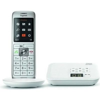 une photo d'un téléphone portable blanc posé sur une table blanche