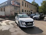 a white car parked in front of a building