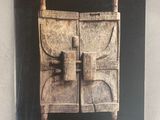 the front cover of a book with an image of a door