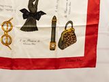 a red and white scarf with a picture of a woman ' s hand holding a purse