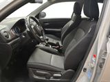 the interior of a car with a black leather seat and a steering wheel