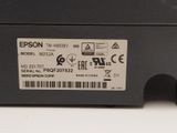 the back of a printer with a label on it ' s side