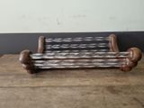 a wooden bench that is sitting on a wooden table