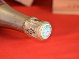a close up of a bottle of champagne on a table