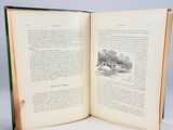 an open book that is sitting on a table