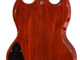 a close up of a guitar with a wooden body on a white background