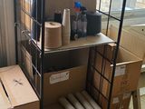 many boxes and boxes on the floor in a room