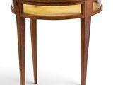 an image of a small table with a glass top and wooden legs
