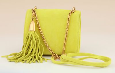 neon yellow tasselled clutch bag with chain strap