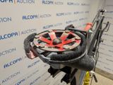 a close up of a bicycle with a helmet on it