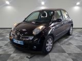 a picture of a small black car on a checkered floor
