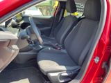 a red car with two seats in the back of it