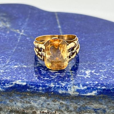 an image of a ring with a citrine stone in it