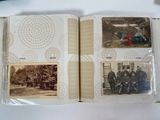 a book with pictures of people on it on a table
