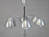 a metal chandelier with five lamps hanging from it