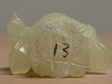 a close up of a plastic object with a number on it