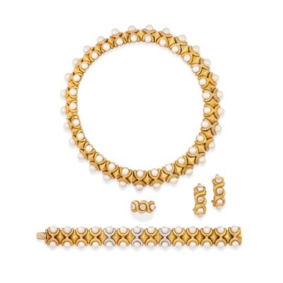 a gold and pearl necklace, bracelet and ring set