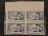 quatre timbres sur lesquels figurent un homme et une femme