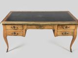 an image of a desk with a black top and two drawers
