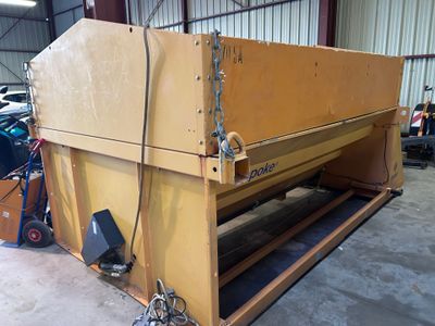 a large machine that is sitting in a warehouse