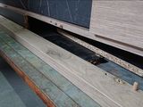 a picture of a piece of wood that is sitting on a bench