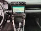 a car dashboard with a gps device in it