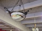 a chandelier hanging from the ceiling in a room