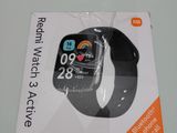a box of a smart watch sitting on top of a table
