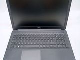 the dell laptop is open and ready to be used