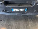 the front bumper of a car with a number plate that says fg - 732 tnn