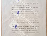 an old letter from a man who is holding a piece of paper in his hand