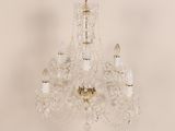 an image of a chandelier hanging from a ceiling in a room