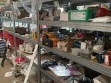 a room with a lot of items on the shelves