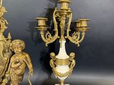 pair of antique brass and marble candelabs with figures on marble bases