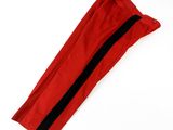 a close up of a pair of red pants with black stripes