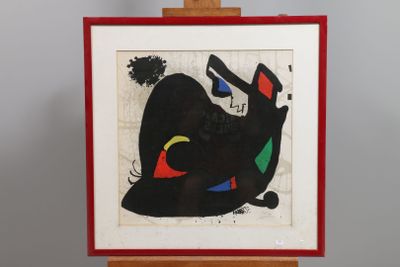 tableau représentant un chat noir posé sur un chevalet en bois à cadre rouge