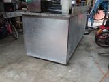 a machine that is sitting inside of a garage
