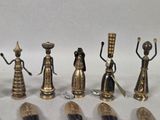 a lot of different types of figurines on the table