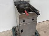 an image of a commercial fryer sitting on a pallet