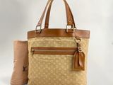 Sac cabas Louis Vuitton en toile Monogram beige et cuir marron