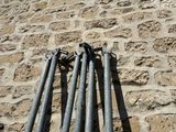 a bunch of pipes attached to the side of a building