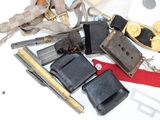 a lot of belts and other items that are on the table