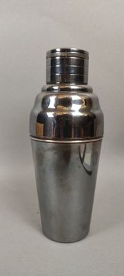silver plated cocktail shaker on a white background