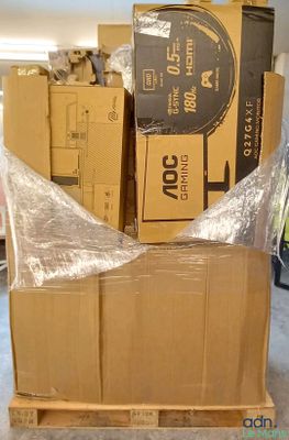 many boxes that are sitting on a pallet in a room