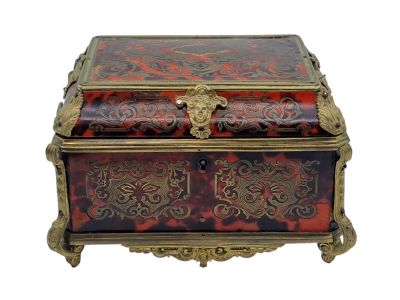 a red and gold box on a white background