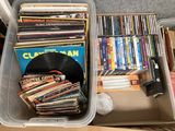 beaucoup de CD et des CD dans un boîtier en plastique